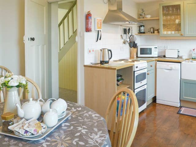 Charming kitchen/ dining room | Pendragon Cottage, Tregatta, near Tintagel