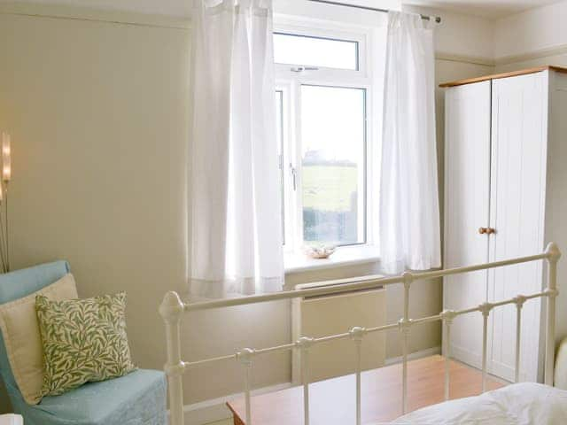 Comfortable double bedroom | Pendragon Cottage, Tregatta, near Tintagel