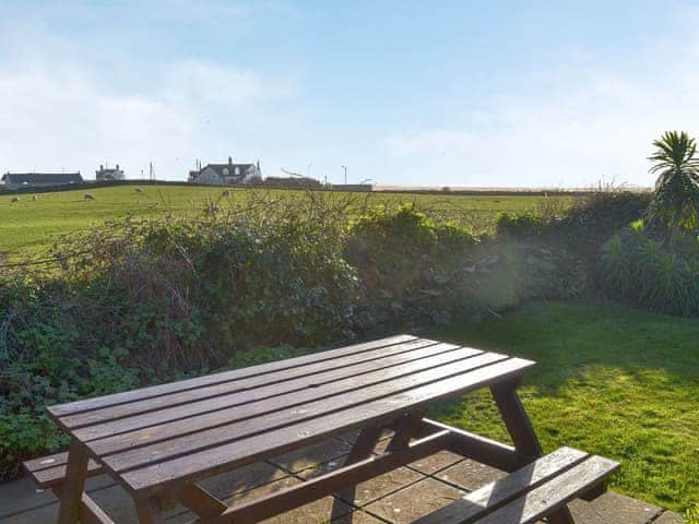 Sitting-out-area | Pendragon Cottage, Tregatta, near Tintagel