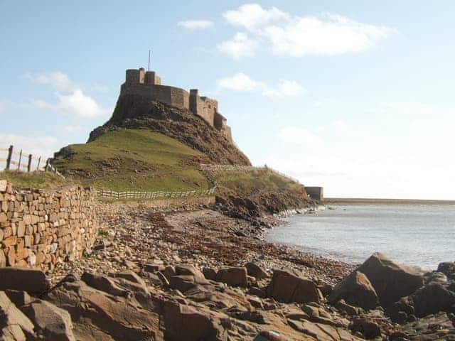 Lindisfarne Castle from the shore | The Old Granary, Holy Island, near Berwick-upon-Tweed