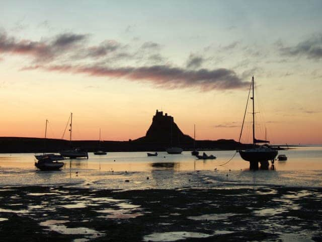 Lindisfarne Castle and harbour at sunrise | The Old Granary, Holy Island, near Berwick-upon-Tweed