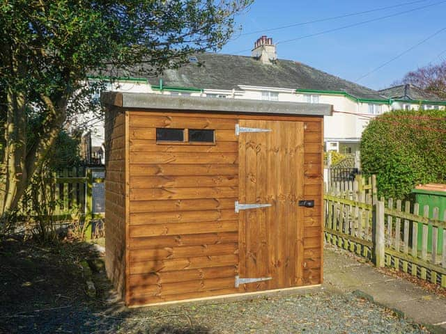 Rear garden with lockable shed for cycles and outdoor equipment | Valentine Cottage, Keswick