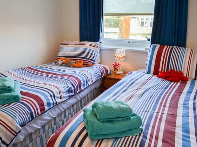 Warm and welcoming twin bedded room | Fairways, Beadnell, near Seahouses