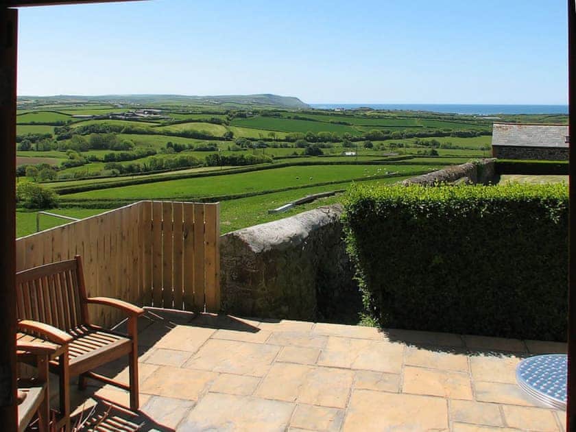 Wonderful far reaching view from your own private patio | Pengenna Parlour - Wooldown Holiday Cottages, Marhamchurch, near Bude