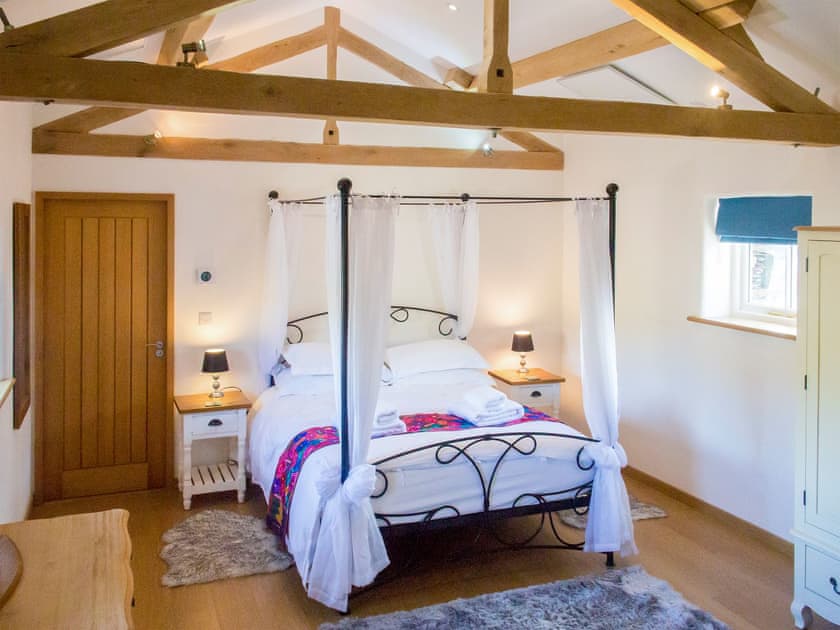 Delightful four poster bedroom | The Stables - High Lowscales, Whicham Valley, near Millom