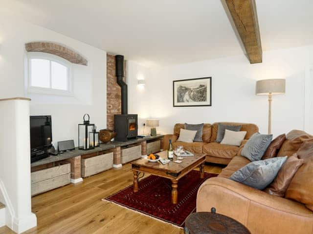 Thoughtfully restored living room with beams | The Mill House, Aisholt, near Bridgwater