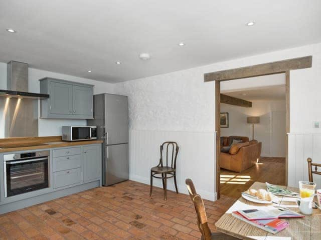 Spacious kitchen/dining room with French doors leading to garden | The Mill House, Aisholt, near Bridgwater