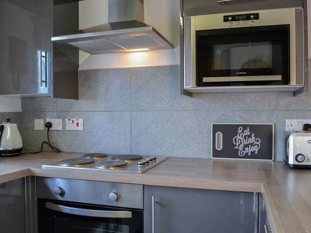 Well-equipped and fitted modest kitchen area | Lucy&rsquo;s Lodge - Doddick Farm Cottages, Threlkeld, near Keswick