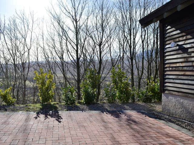 Block paved area adjacent to the property and the wonderful view | Lucy&rsquo;s Lodge - Doddick Farm Cottages, Threlkeld, near Keswick