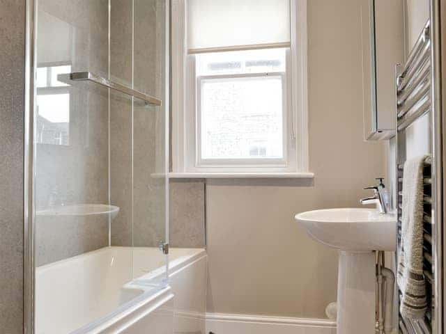 Family bathroom with shower over bath | Blencathra House, Keswick