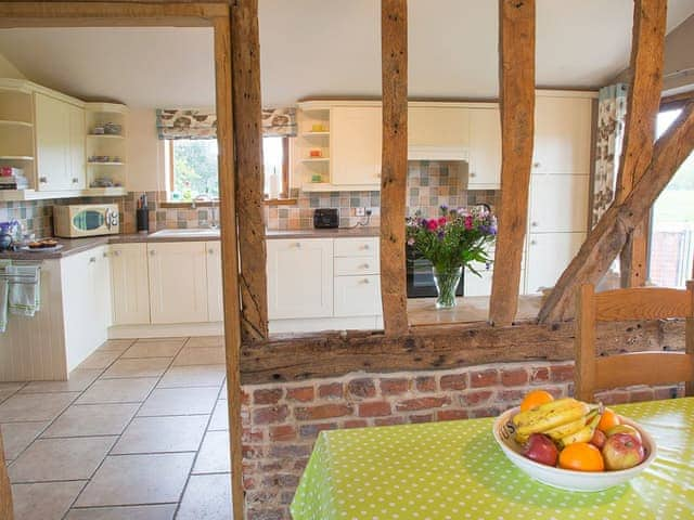 Convenient dining area and well-equipped kitchen | Henry&rsquo;s Barn - Old Hall Farm Cottages, Walpole, near Halesworth