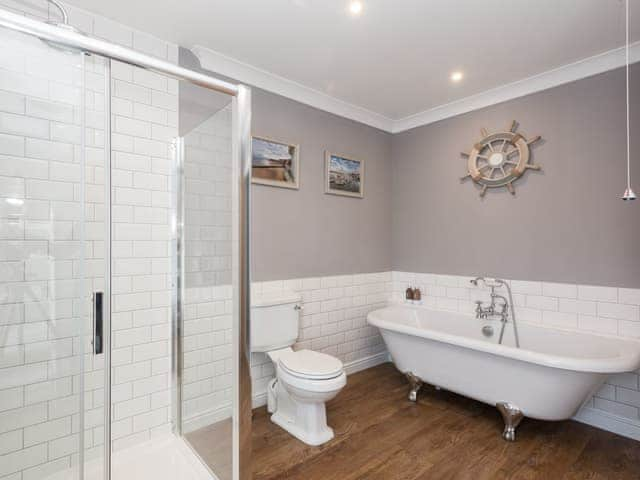 Lovely bathroom with roll-top bath | Amelia House, Sheringham