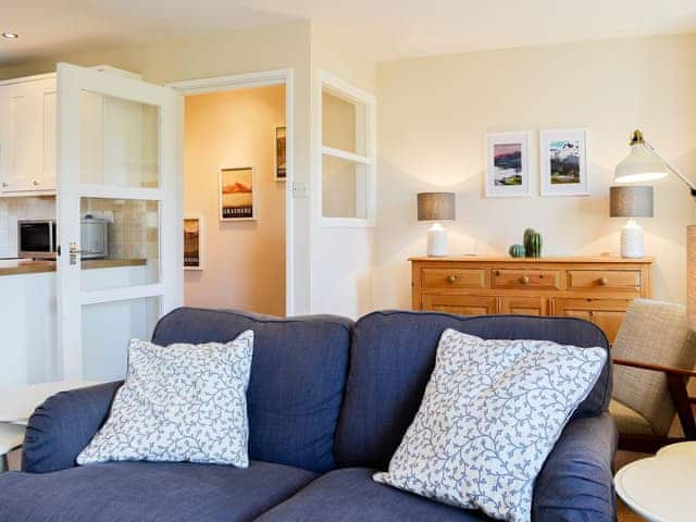 Cosy and welcoming open plan living area | Melbreak, High Lorton, near Cockermouth