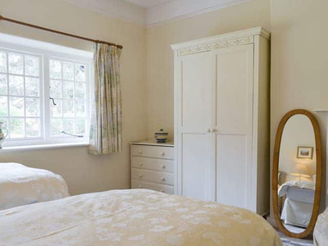 Ample storage within the twin bedroom | Broomriggs Cottage, Near Sawrey, Hawkshead