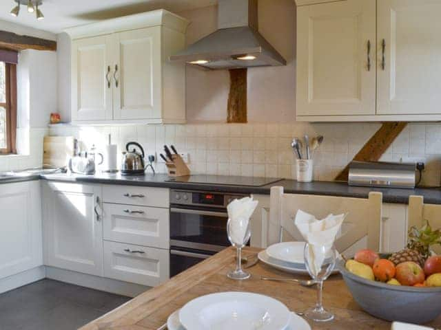 Well-equipped fitted kitchen | Stocks Tree Cottage, Preston Wynne