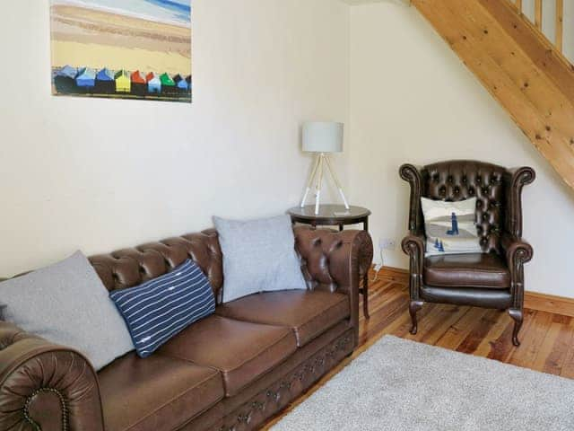 Comfy seating within living room | Jenny&rsquo;s Cottage, Mundesley