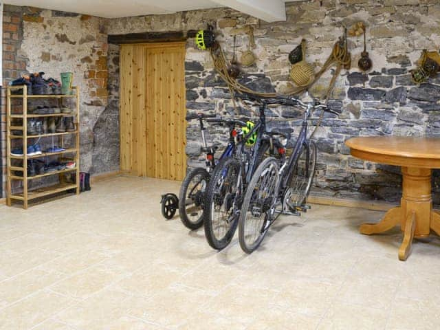 Large utility room with bike/boot store and laundry areas | The Old Granary, Holy Island, near Berwick-upon-Tweed