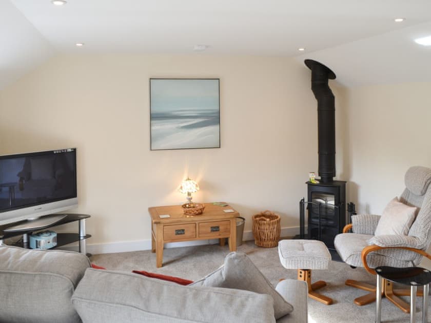Lounge area with wood burner | Knights Den, Port Isaac