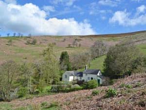Delightful cottage in a secluded setting | Upper Stanbatch Cottage, Wentnor, near Bishops Castle