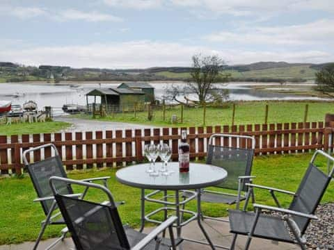 Peaceful sitting-out-area with wonderful waterside views | Silver Dee, Crossmichael, near Castle Douglas