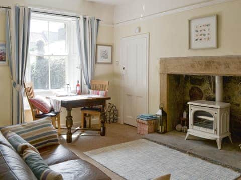 Welcoming living room with wood burner | Grosvenor Cottage, Alnmouth