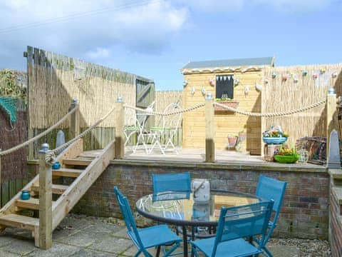 Delightful split-level patio area | Sea Shore - Tee View and Sea Shore, Seahouses