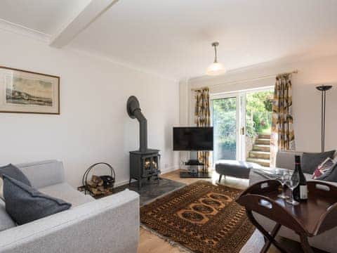 Living room with wood burner | Crinkum, Titchwell, near Hunstanton