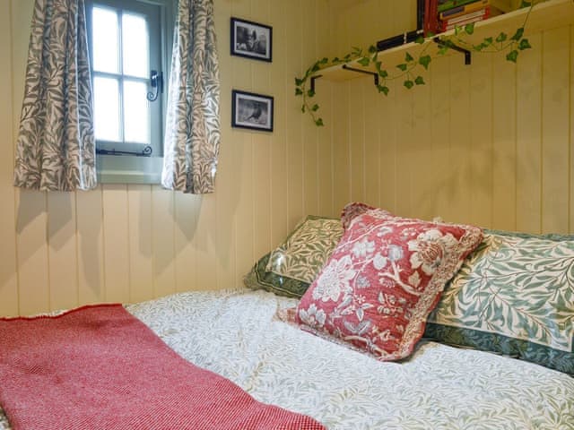 Comfortable double bed in sleeping area | Farmer Oak&rsquo;s Hut, Dippertown, near Tavistock