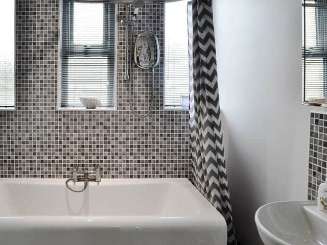 Bathroom with shower over bath | The Old Parish Hall, Seahouses, near Alnwick