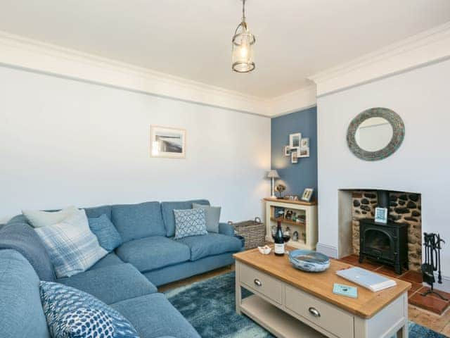 Attractively decorated living room with wood burner | Ascot Villa, Sheringham