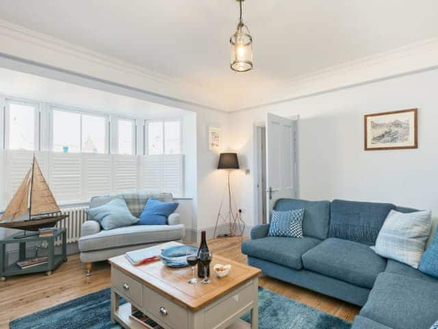 Attractively decorated living room with wood burner | Ascot Villa, Sheringham