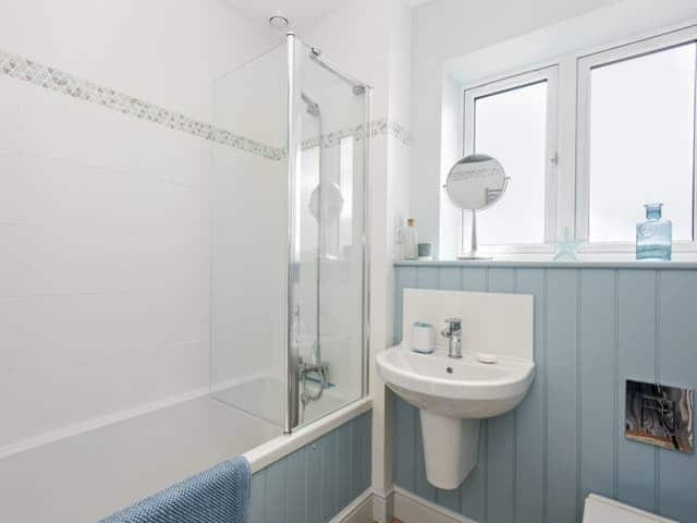 Bathroom with shower over bath | Ascot Villa, Sheringham