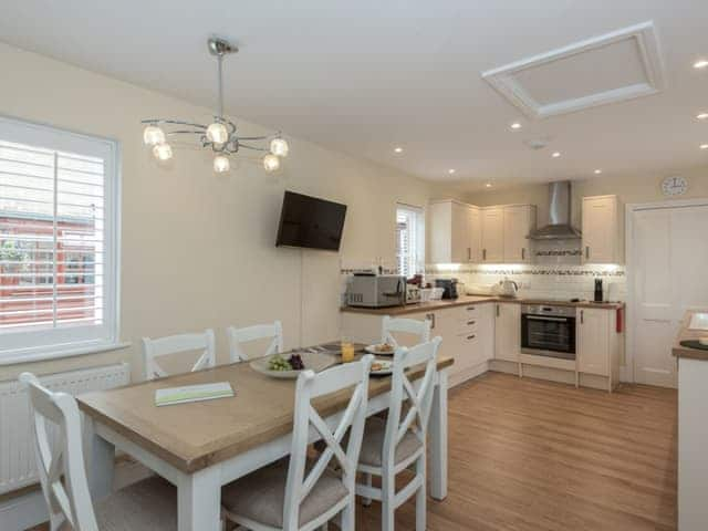 Kitchen with dining area | The Coach House, Wootton, near Ryde