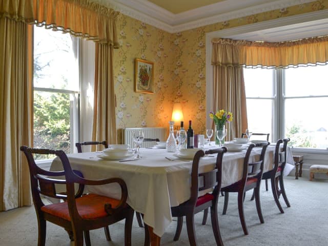 Large dining room with open fire | Tirril Lodge, Tirril, Ullswater