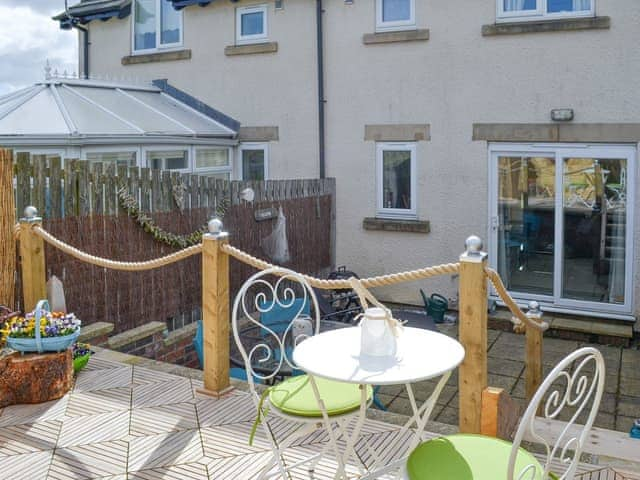 Attractive dual-level patio area | Sea Shore - Tee View and Sea Shore, Seahouses