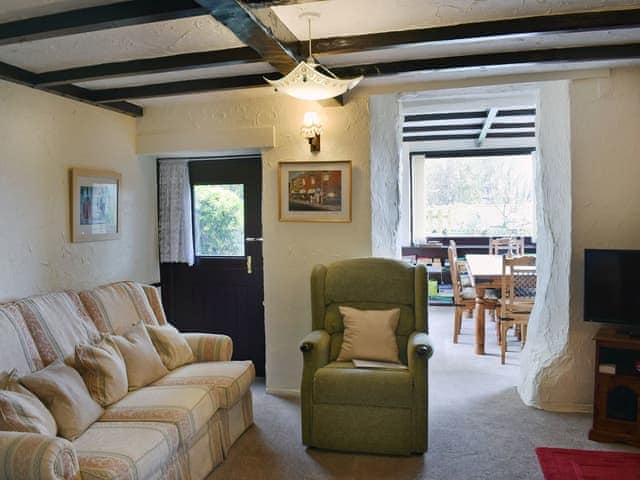 Characterful living room with exposed beams | Hayrake, Ambleside