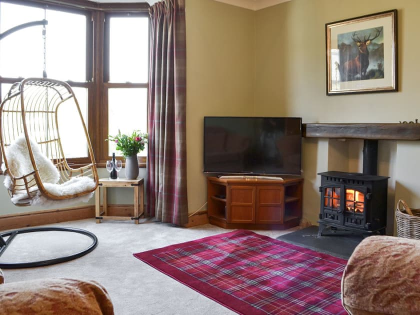 Living room with wood burner | Orrest View, Windermere
