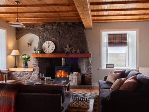 Warm and welcoming living room with wood burner | High Ranachan, Campbeltown