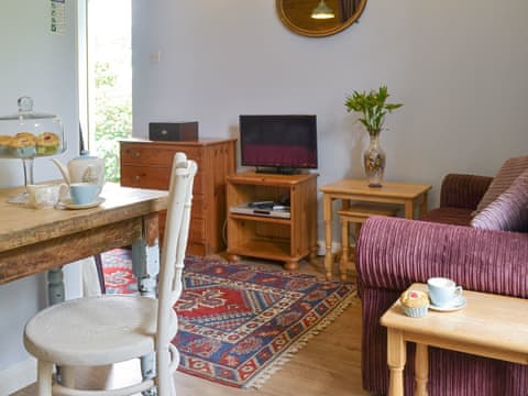 Convenient open-plan living space | Garden Cottage - Berry Park, Welcombe, near Bude