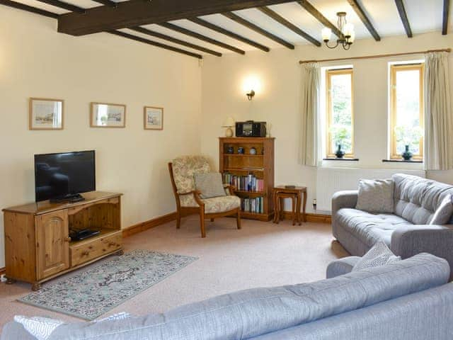 Welcoming living room | Sawmill Cottage - The Old Timberyard, Puncknowle, near Dorchester