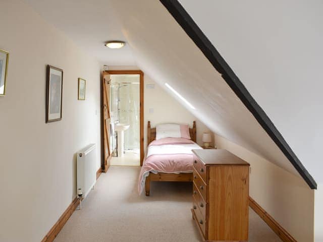 Cosy single bed area within the en-suite triple bedroom | Sawmill Cottage - The Old Timberyard, Puncknowle, near Dorchester