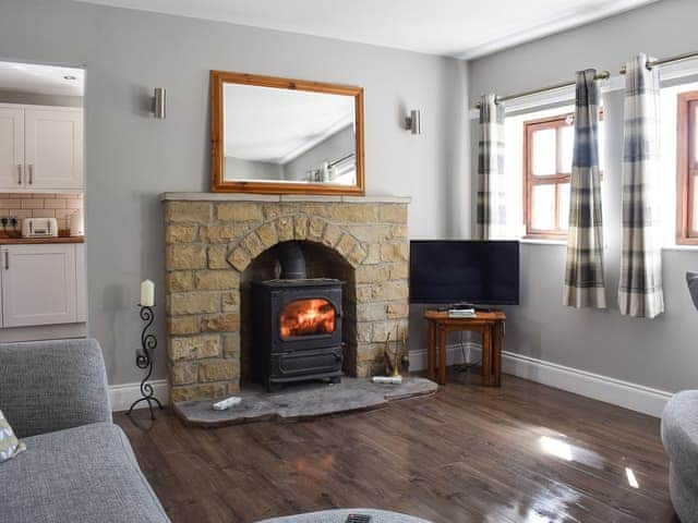 Living room with multi-fuel burner | Tavern Cottage - Tavern Cottages, Newsham, near Richmond