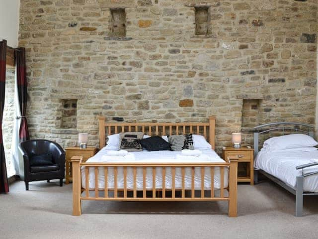 Double bedroom with en-suite bathroom | The Farmhouse - Bowlees Holiday Cottages, Wolsingham, near Stanhope