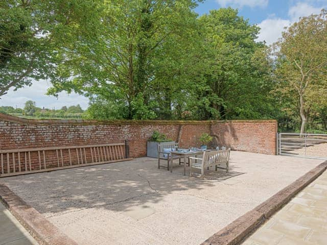 Spacious patio with high quality outdoor furniture | The Cowshed, Reepham