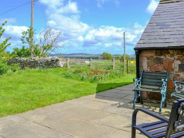 Sitting out area in the garden | Sandyhouse Cottage, Milfield, near Wooler