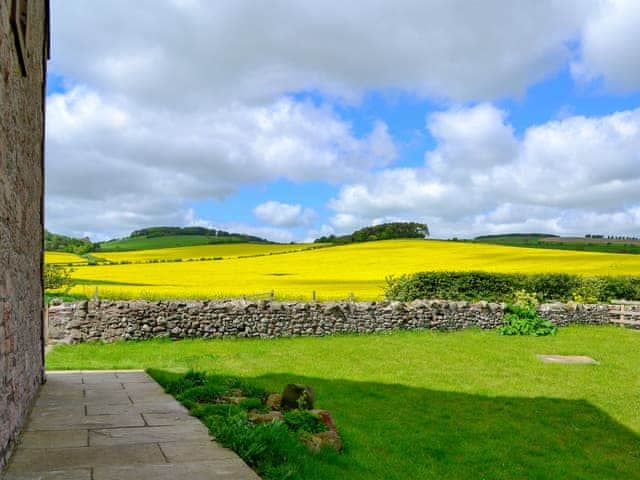 Beautiful countryside views from the garden | Sandyhouse Cottage, Milfield, near Wooler