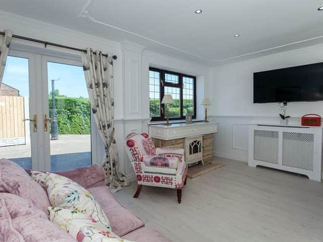 Tastefully modernised living area | Buttercup Cottage, Halsall, near Ormskirk