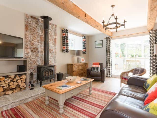 Welcoming living area with wood burning fire | The Barn - Oak Tree Farm, West Witton, near Leyburn