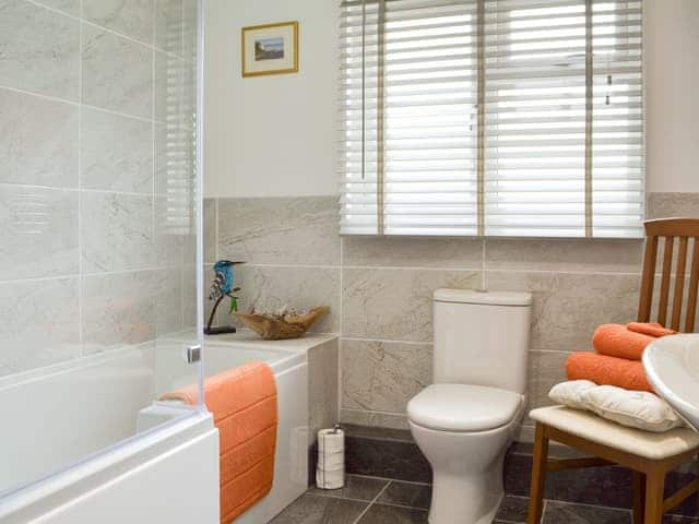 Family bathroom with shower over bath | Cedar Lodge, Cowbeech, near Hailsham