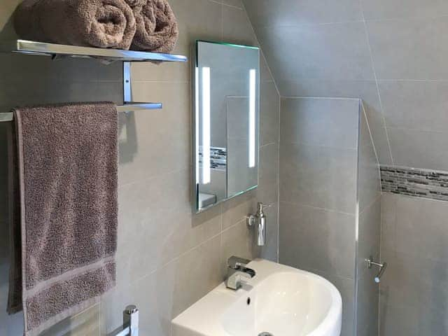 Bathroom with illuminated mirror | Willow Cottage, Great Ryburgh, near Fakenham